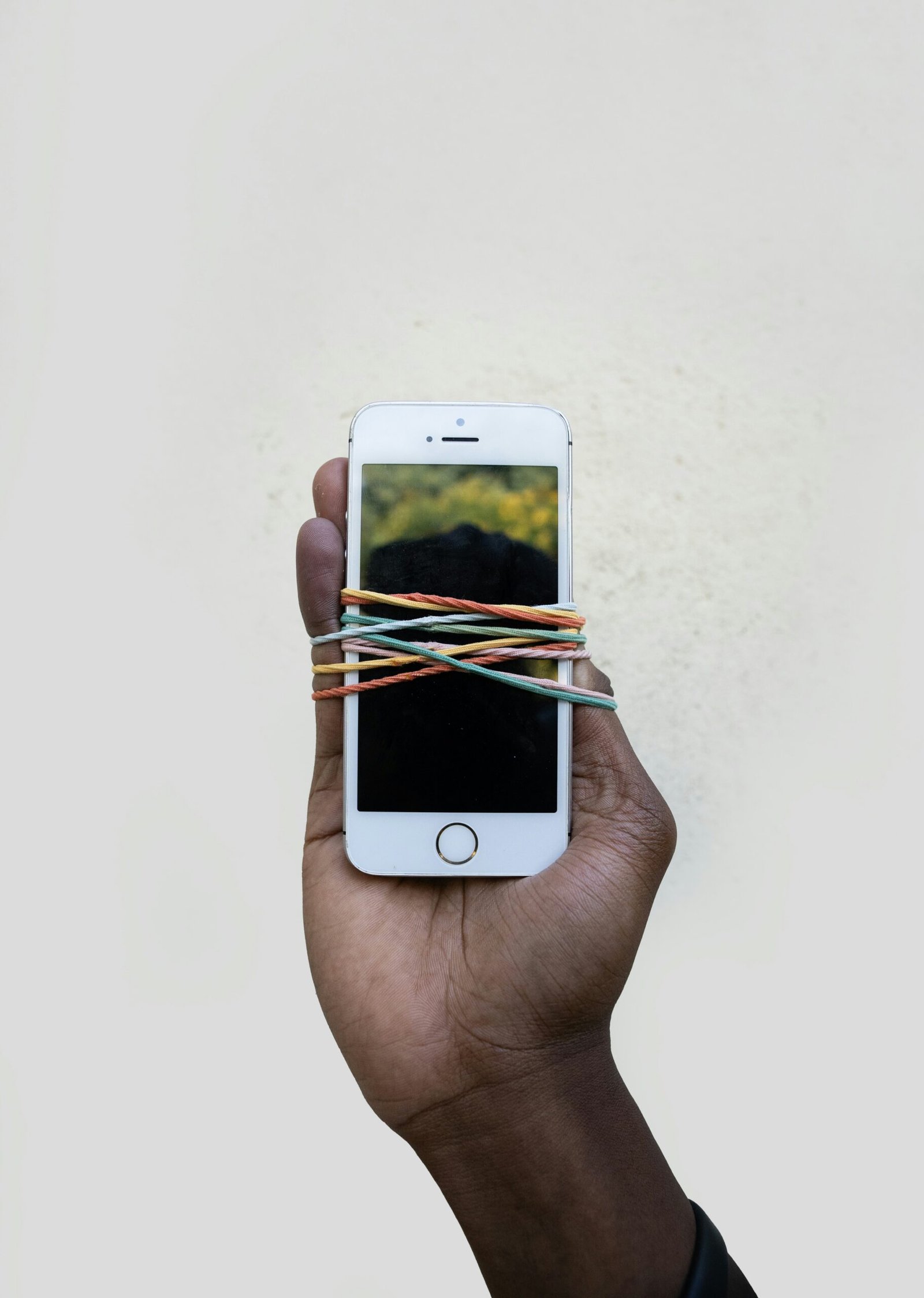 African child looking at phone